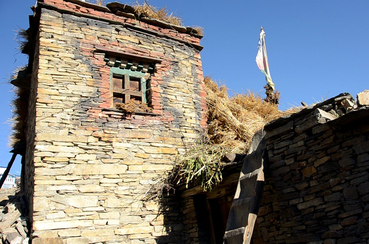 07 House In Nar Village With Ladder To Roof Stacked With Hay 